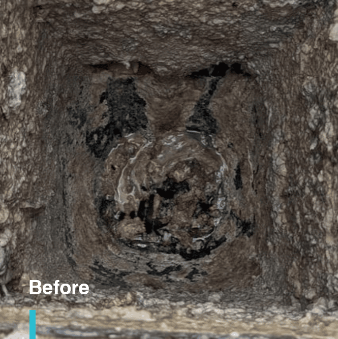 Clogged floor drain with mud that requires deep pressure washer cleaning